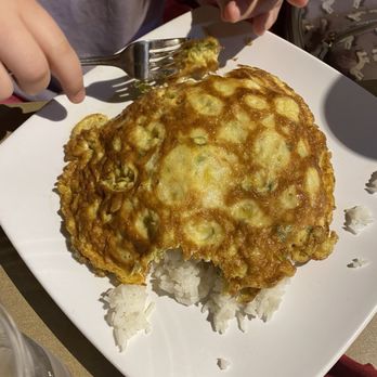 Thai Orchid Restaurant - Thai Omelette- flavorful omelette with scallions and black pepper served over rice and a sriracha sauce. - Thai Near Me - West Fargo, North Dakota