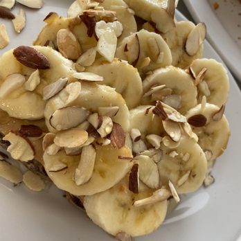 The Gathering Cafe - Wheat toast with PB, bananas, honey and almonds. - Breakfast & Brunch Near Me - Ocala, Florida The Gathering Cafe - Wheat toast with PB, bananas, honey and almonds. - Breakfast & Brunch Near Me - Ocala, Florida