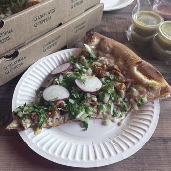 Mercy’s Pizza Taco - a slice of pizza on a paper plate - Pizza Near Me - Pasco, Washington Mercy’s Pizza Taco - a slice of pizza on a paper plate - Pizza Near Me - Pasco, Washington