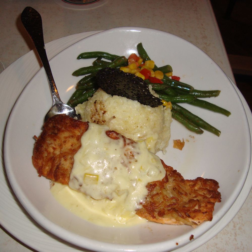 Guppys on the Beach - Potato crusted salmon risotto - Seafood Near Me - Indian Rocks Beach, Florida Guppys on the Beach - Potato crusted salmon risotto - Seafood Near Me - Indian Rocks Beach, Florida