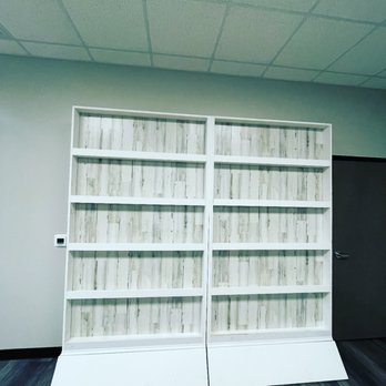 AB Custom Construction - a pair of bookcases in an empty room - General Contractors Near Me AB Custom Construction - a pair of bookcases in an empty room - General Contractors Near Me