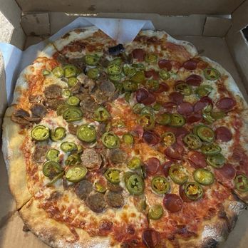Serafina’s Pizzeria - Half sausage and half pepperoni with jalapeños. - Pizza Near Me - St Johns, Florida Serafina’s Pizzeria - Half sausage and half pepperoni with jalapeños. - Pizza Near Me - St Johns, Florida
