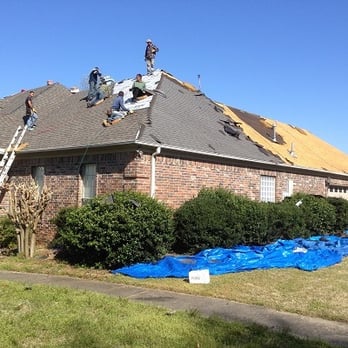 Pitch Perfect Roofing - Crew removing the old shingles. - Roofing Near Me - North Little Rock, Arkansas Pitch Perfect Roofing - Crew removing the old shingles. - Roofing Near Me - North Little Rock, Arkansas