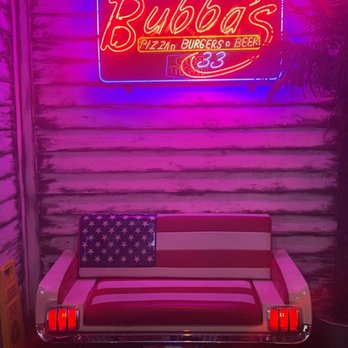 Bubba's 33 - a chair and neon sign - American Near Me - San Antonio, Texas Bubba's 33 - a chair and neon sign - American Near Me - San Antonio, Texas