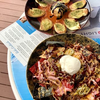 Rick's Café Boatyard - Goat cheese with garlic bread and the pork nachos - American Near Me - Indianapolis, Indiana Rick's Café Boatyard - Goat cheese with garlic bread and the pork nachos - American Near Me - Indianapolis, Indiana