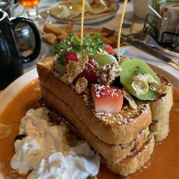 Banana Leaf - Thai tea French toast and curry potatoes in background - Breakfast & Brunch Near Me - El Cerrito, California Banana Leaf - Thai tea French toast and curry potatoes in background - Breakfast & Brunch Near Me - El Cerrito, California