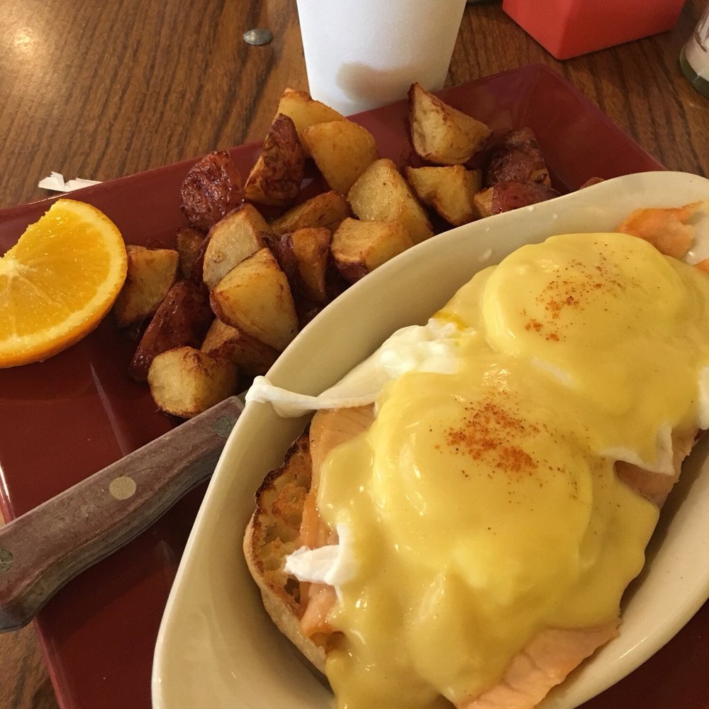 Toasted Mango Cafe - Blackened Salmon Benedict comes with potatoes. They're delicious once you add some salt! - Cafes Near Me - Sarasota, Florida Toasted Mango Cafe - Blackened Salmon Benedict comes with potatoes. They're delicious once you add some salt! - Cafes Near Me - Sarasota, Florida