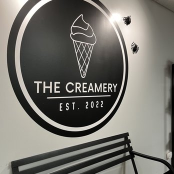 The Creamery - a bench in front of a sign - Ice Cream & Frozen Yogurt Near Me - Hilton, New York The Creamery - a bench in front of a sign - Ice Cream & Frozen Yogurt Near Me - Hilton, New York