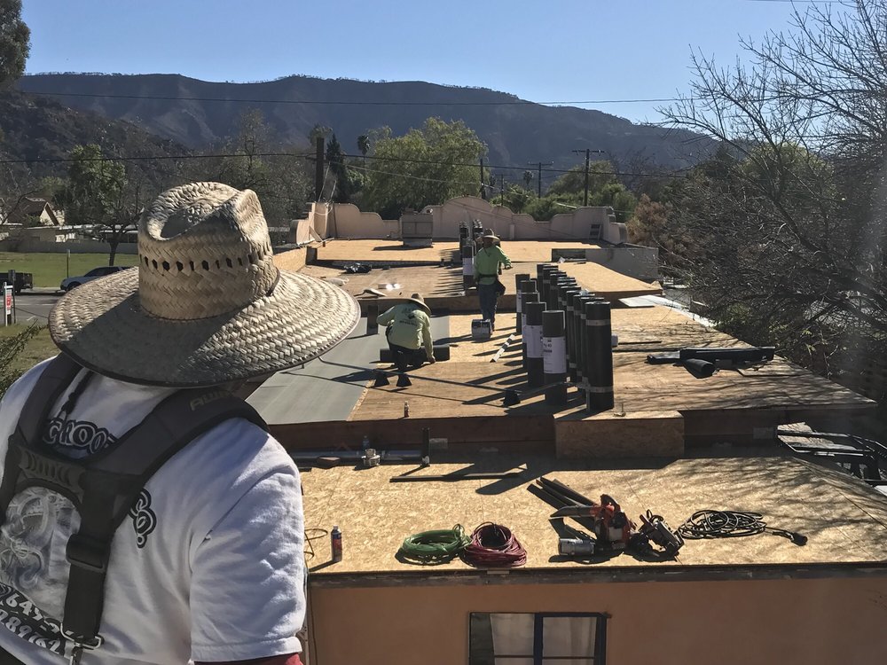 Slide of Aztec Roofing