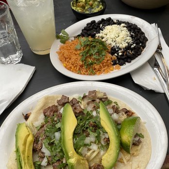 Fonda La Catrina - Carne asada tacos with side of beans and rice - Mexican Near Me - Seattle, Washington Fonda La Catrina - Carne asada tacos with side of beans and rice - Mexican Near Me - Seattle, Washington