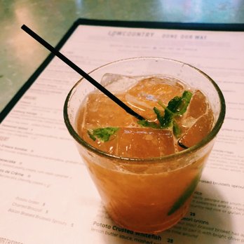 The Northside Social - Hound Dog cocktail - Maker's Mark, fresh peach purée, ginger simple, lemon juice and mint muddle - American Near Me - Indianapolis, Indiana The Northside Social - Hound Dog cocktail - Maker's Mark, fresh peach purée, ginger simple, lemon juice and mint muddle - American Near Me - Indianapolis, Indiana