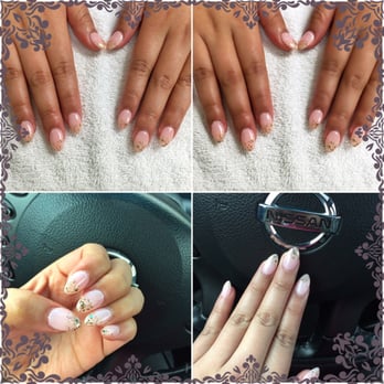 Elegant Nails - Almond shaped nails with pastel pink base and gold glitter on the ends. $37 - Nail Salons Near Me - Lacey, Washington