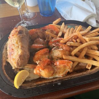 The Back Porch - Crab stuffed shrimp with twice baked potato and fries - Seafood Near Me - Destin, Florida