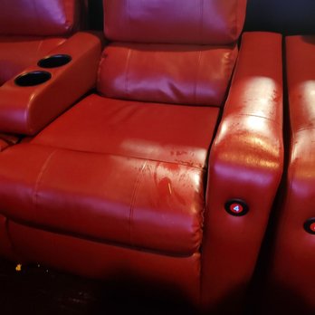 AMC Orange Park 24 - Soda and grass on seats - Cinema Near Me - Orange Park, Florida