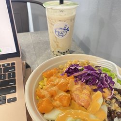 Salmon fresh poke bowl with bubble milk green tea