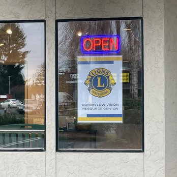 Lions Low Vision Center - front window of building with open sign and Lions low vision sign - Community Service/Non-Profit Near Me - Olympia, Washington Lions Low Vision Center - front window of building with open sign and Lions low vision sign - Community Service/Non-Profit Near Me - Olympia, Washington