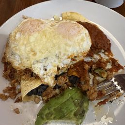 Huevos Rancheros, after a couple of bites ;) Huevos Rancheros, after a couple of bites ;)