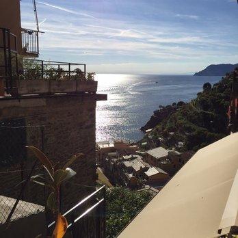 Trattoria dal Billy - The view from inside (not on the patio). Many people put so much value in the view, but the quality of food is the real X factor here - Italian Near Me - Manarola, SP Trattoria dal Billy - The view from inside (not on the patio). Many people put so much value in the view, but the quality of food is the real X factor here - Italian Near Me - Manarola, SP