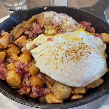 Hash Kitchen - Corned beef hash with over/easy eggs and potatoes.   Delicious! - Breakfast & Brunch Near Me - Scottsdale, Arizona