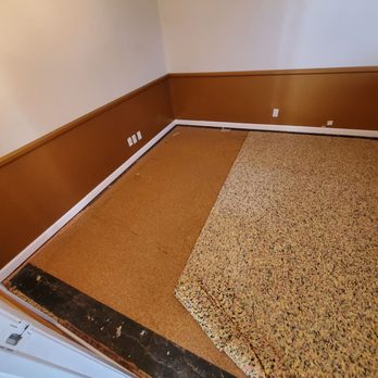 Ventura Flooring - Mid-construction. Carpet removed, tiles exposed. - Flooring Near Me - Simi Valley, California