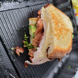 Eggs Up Grill - Got the Turkey, Bacon and Avocado Sandwich to go. Yes, I ate half of it already, lol. Delicious sandwich!