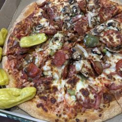 The works pizza with extra mushrooms