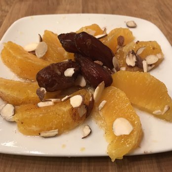 Kitchenwares On The Square - Dates & oranges supreme drizzled with lemon juice, cinnamon, sugar, & almond slivers served as dessert during the Moroccan cooking class. - Kitchen & Bath Near Me - McKinney, Texas