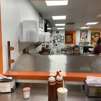 Fresko Snacks - a woman behind a counter in a restaurant - Mexican Near Me - Tulsa, Oklahoma Fresko Snacks - a woman behind a counter in a restaurant - Mexican Near Me - Tulsa, Oklahoma