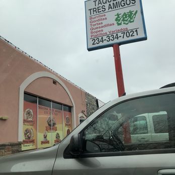 Taqueria Tres Amigos - a car parked in front of a store - Mexican Near Me - Akron, Ohio Taqueria Tres Amigos - a car parked in front of a store - Mexican Near Me - Akron, Ohio