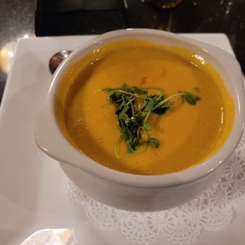 La Malbec Bar & Restaurant - Ginger Coconut Carrot Soup with a garnish - Spanish Near Me - Bloomsburg, Pennsylvania La Malbec Bar & Restaurant - Ginger Coconut Carrot Soup with a garnish - Spanish Near Me - Bloomsburg, Pennsylvania