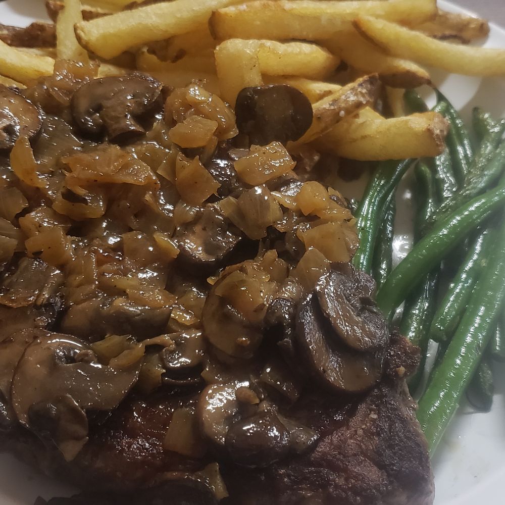Maggie's Restaurant - Rib-eye steak, smothered with onions and mushrooms. - Burgers Near Me - Vallejo, California Maggie's Restaurant - Rib-eye steak, smothered with onions and mushrooms. - Burgers Near Me - Vallejo, California