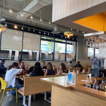 Yolks - people sitting at tables in a restaurant - Breakfast & Brunch Near Me - Vancouver, British Columbia Yolks - people sitting at tables in a restaurant - Breakfast & Brunch Near Me - Vancouver, British Columbia