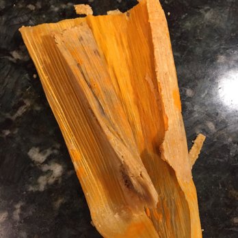 Magdalena's Tamales - a close up of a tamale - Mexican Near Me
