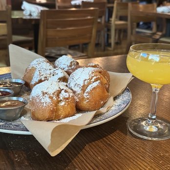 MoCo's Founding Farmers - Uncle Buck's Beignets & Mimosa - New American Near Me - Potomac, Maryland MoCo's Founding Farmers - Uncle Buck's Beignets & Mimosa - New American Near Me - Potomac, Maryland