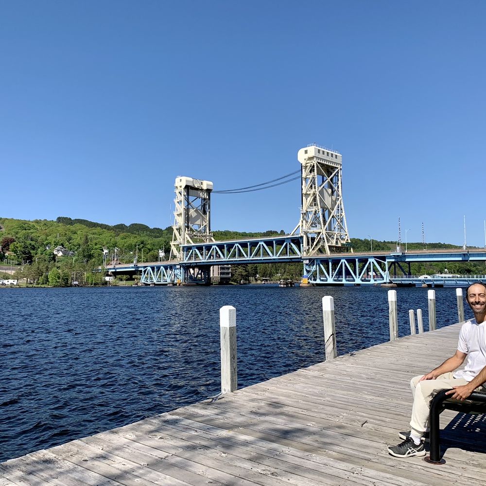 Houghton Waterfront Park - Houghton Waterfront Park has a picturesque setting with the Portage Lake Bridge in the backdrop. - Parks Near Me - Houghton, Michigan Houghton Waterfront Park - Houghton Waterfront Park has a picturesque setting with the Portage Lake Bridge in the backdrop. - Parks Near Me - Houghton, Michigan
