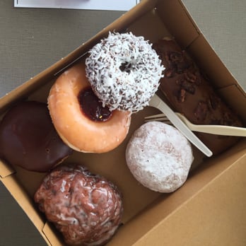 Top Pot Doughnuts - Raspberry, blueberries, chocolate, coconut, maple bacon, cream filling. - Donuts Near Me - Issaquah, Washington Top Pot Doughnuts - Raspberry, blueberries, chocolate, coconut, maple bacon, cream filling. - Donuts Near Me - Issaquah, Washington