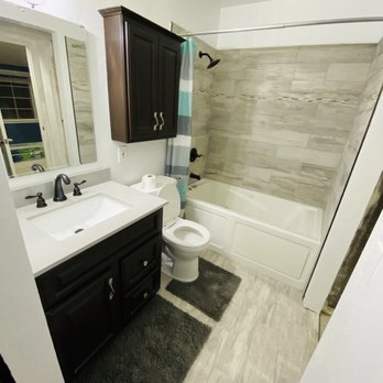 RB Construction - a bathroom with a sink, toilet, and bathtub - General Contractors Near Me RB Construction - a bathroom with a sink, toilet, and bathtub - General Contractors Near Me