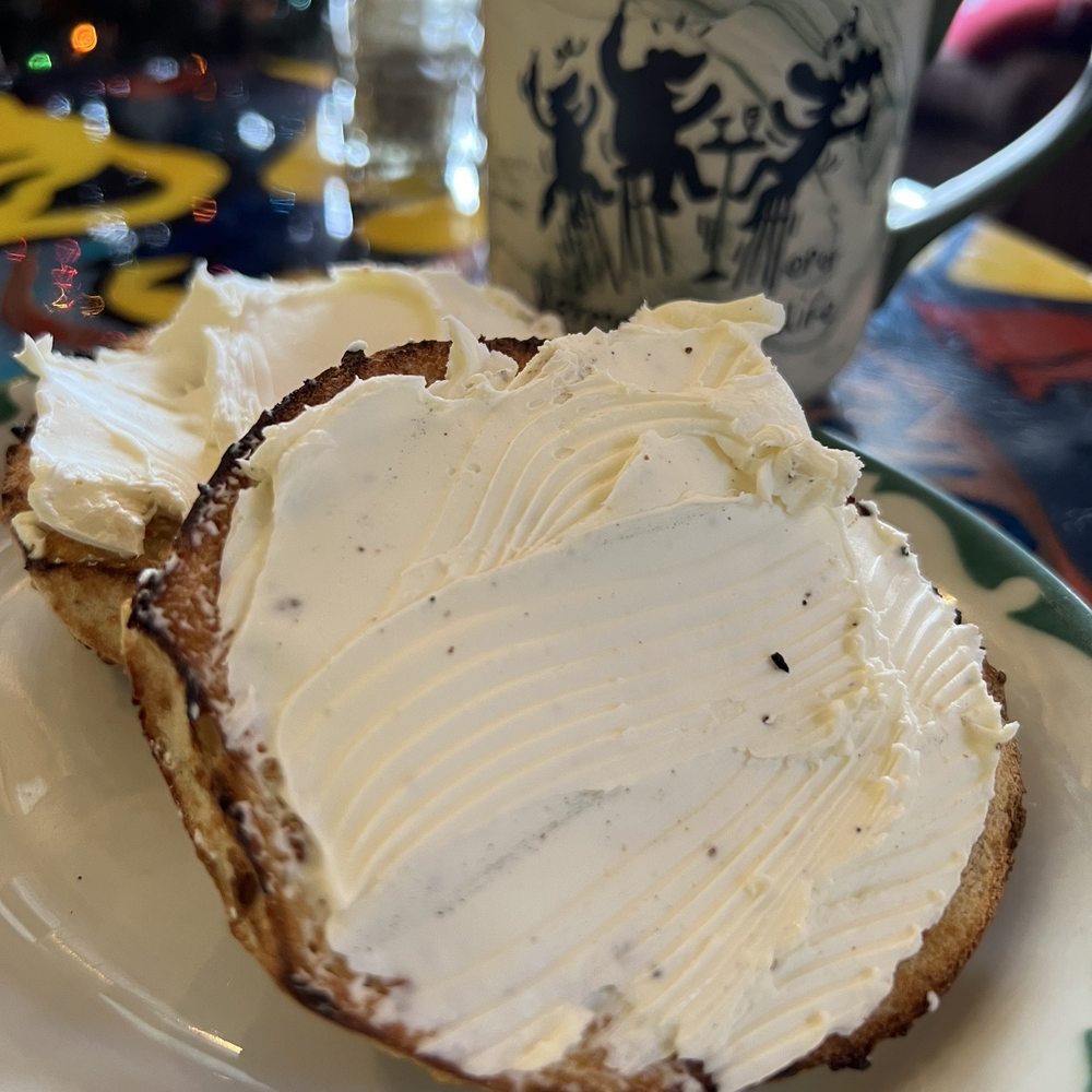 Las Vetas Lounge - a plate with a piece of bread and a cup of coffee - Coffee & Tea Near Me - Fairfield, Connecticut