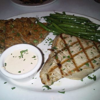 Piatti - Grilled Ahi Tuna Steak with Risotto Cakes & green beans. Don't recall the name of the sauce, but it was perfect for the fish. - Italian Near Me - La Jolla, California Piatti - Grilled Ahi Tuna Steak with Risotto Cakes & green beans. Don't recall the name of the sauce, but it was perfect for the fish. - Italian Near Me - La Jolla, California