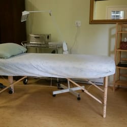 Debra's Electrolysis Studio - Large comfortable private treatment area & electronic charging station for your convenience. There is a separate area for permanent makeup.