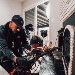 Den Defenders Chimney & Fireplace Service - chimney sweep Den Defenders technician