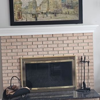 Storge Electric - Samsung Frame tv installed over fireplace. - Electricians Near Me - Manchester, Connecticut