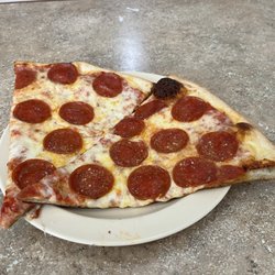 Pezzo Pizza One - Pizza by the slice with Pepperoni.