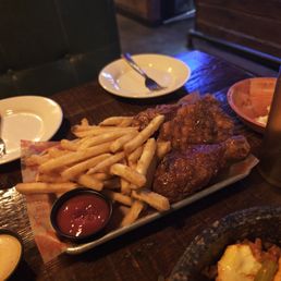 Individual chicken combo with fries. Two drummies and a boneless thigh. Soy garlic and spicy. Individual chicken combo with fries. Two drummies and a boneless thigh. Soy garlic and spicy.