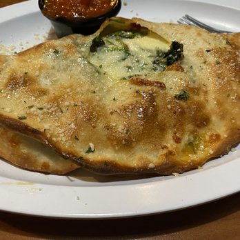 Jimmy's Italian Kitchen - Cheese, pepperoni and spinach calzone - Italian Near Me - Kettering, Ohio Jimmy's Italian Kitchen - Cheese, pepperoni and spinach calzone - Italian Near Me - Kettering, Ohio