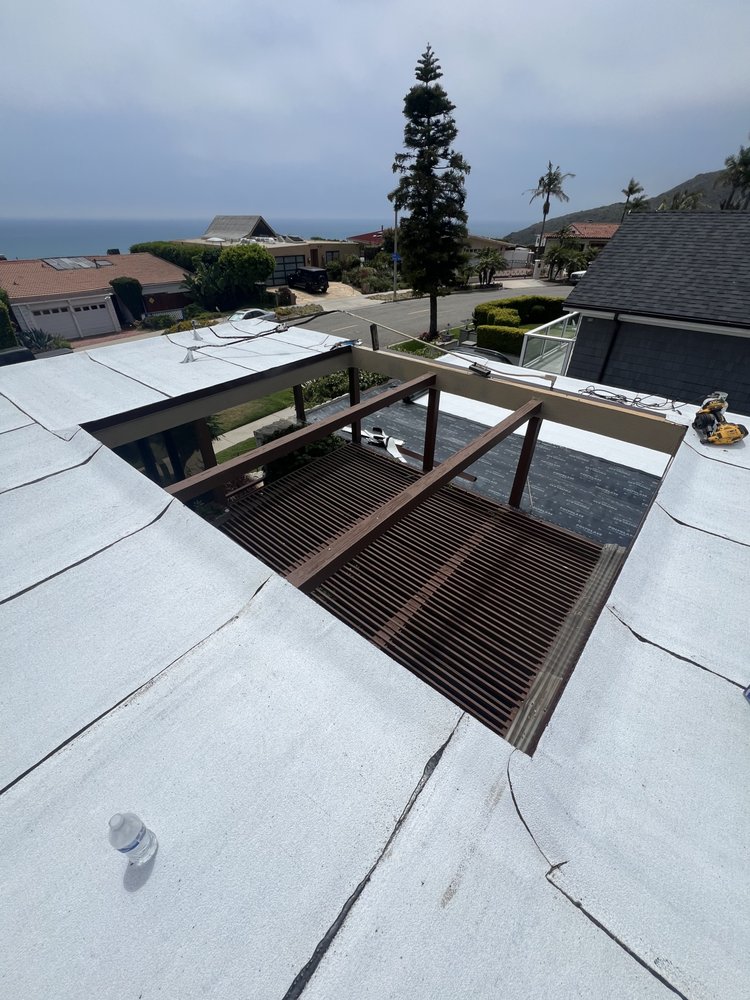Slide of Reign Roofing