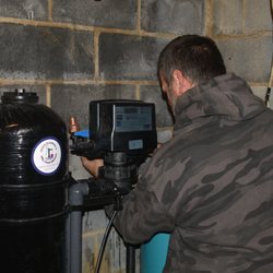 Casco Plumbing and Well Pump Service - Shawn installing a water filtration system in Yellow Springs WV