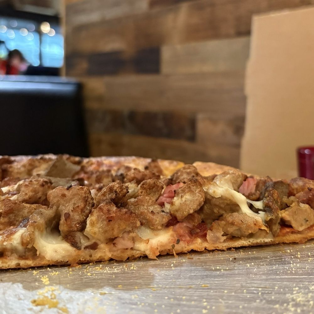 Pizza Navona - Tried to get a picture of the thickness of the meat!! - Pizza Near Me - Farmington, Arkansas Pizza Navona - Tried to get a picture of the thickness of the meat!! - Pizza Near Me - Farmington, Arkansas