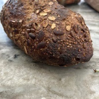 OWL Bakery - Burned loaf of seeded bread - Bakeries Near Me - Asheville, North Carolina OWL Bakery - Burned loaf of seeded bread - Bakeries Near Me - Asheville, North Carolina