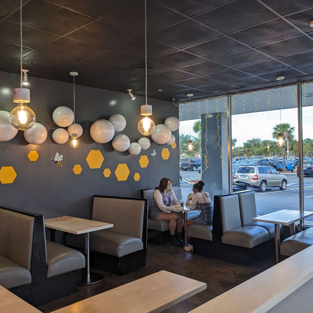 Quickly Boba N Snow - a woman sitting in a restaurant - Bubble Tea Near Me - Orlando, Florida Quickly Boba N Snow - a woman sitting in a restaurant - Bubble Tea Near Me - Orlando, Florida